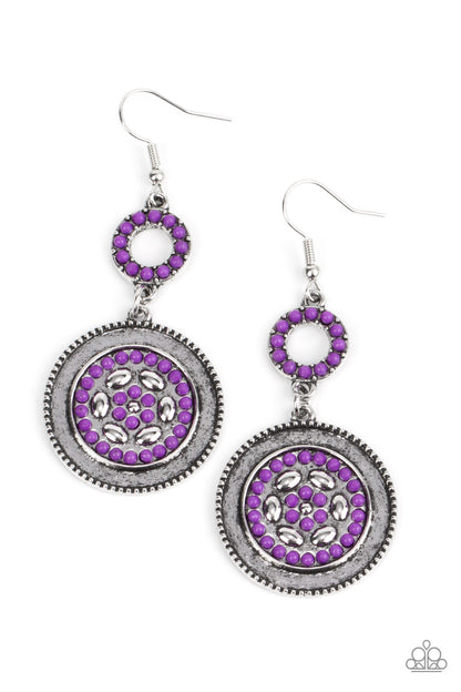 Meadow Mantra - Purple Item #P5WH-PRXX-242XX Dotted in dainty purple seed beads, a dainty silver hoop links to an ornate silver disc for a colorful floral finish. Earring attaches to a standard fishhook fitting.  Sold as one pair of earrings.