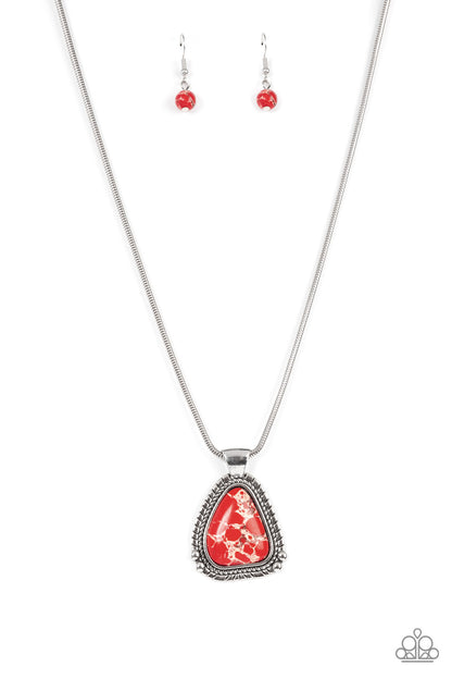 Artisan Adventure Red Necklace - Paparazzi Accessories  Featuring a studded and textured silver frame, an asymmetrical red stone pendant glides along a rounded silver snake chain below the collar for an authentically artisan-inspired fashion. Features an adjustable clasp closure.  Sold as one individual necklace. Includes one pair of matching earrings.