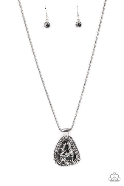 Artisan Adventure Black Necklace - Paparazzi Accessories  Featuring a studded and textured silver frame, an asymmetrical black stone pendant glides along a rounded silver snake chain below the collar for an authentically artisan-inspired fashion. Features an adjustable clasp closure.  Sold as one individual necklace. Includes one pair of matching earrings.