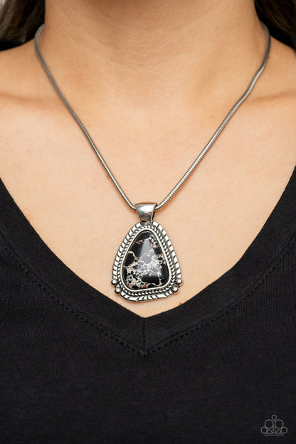 Artisan Adventure Black Necklace - Paparazzi Accessories  Featuring a studded and textured silver frame, an asymmetrical black stone pendant glides along a rounded silver snake chain below the collar for an authentically artisan-inspired fashion. Features an adjustable clasp closure.  Sold as one individual necklace. Includes one pair of matching earrings.