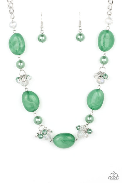 The Top TENACIOUS Green Necklace - Paparazzi Accessories  Featuring a faux stone look, a refreshing collection of cloudy Leprechaun beads join bubbly Leprechaun pearls, and white crystal-like gems below the collar. Dainty clusters of Leprechaun pearls, flat silver beads, and white crystal-like gems adorn the display, adding effervescent movement to the whimsical scene. Features an adjustable clasp closure.  Sold as one individual necklace. Includes one pair of matching earrings.