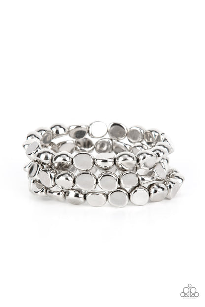 HAUTE Stone Silver Bracelet - Paparazzi Accessories  Featuring irregular stone shapes, a shiny series of silver beads are threaded along stretchy bands around the wrist for a bold pop of monochromatic magic.  Sold as one set of three bracelets.