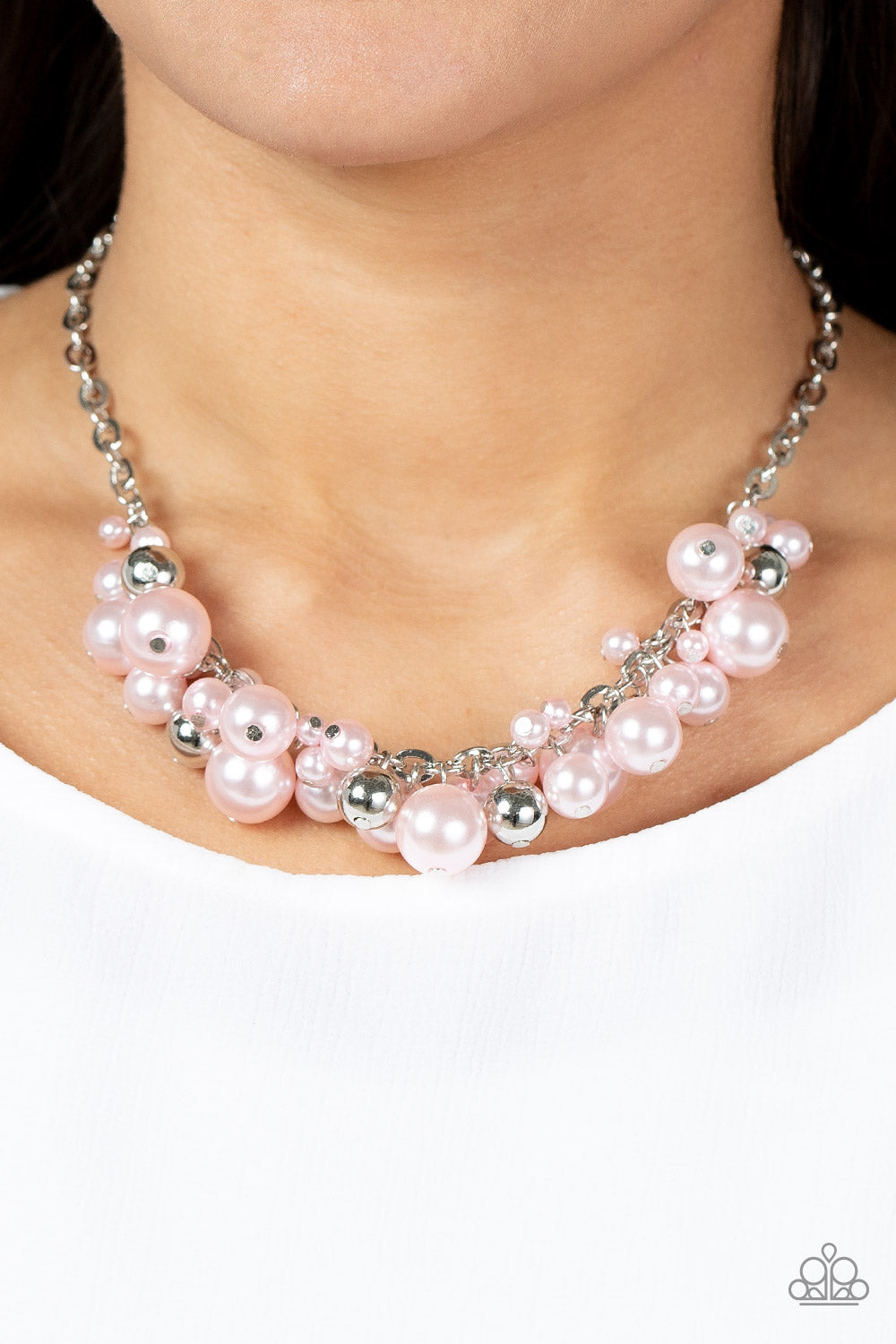 Classical Culture Pink Necklace - Paparazzi Accessories  An effervescent collection of bubbly pink pearls and shiny silver beads delicately cluster along the center of an ornate silver chain, creating a classic fringe below the collar. Features an adjustable clasp closure.  Sold as one individual necklace. Includes one pair of matching earrings.