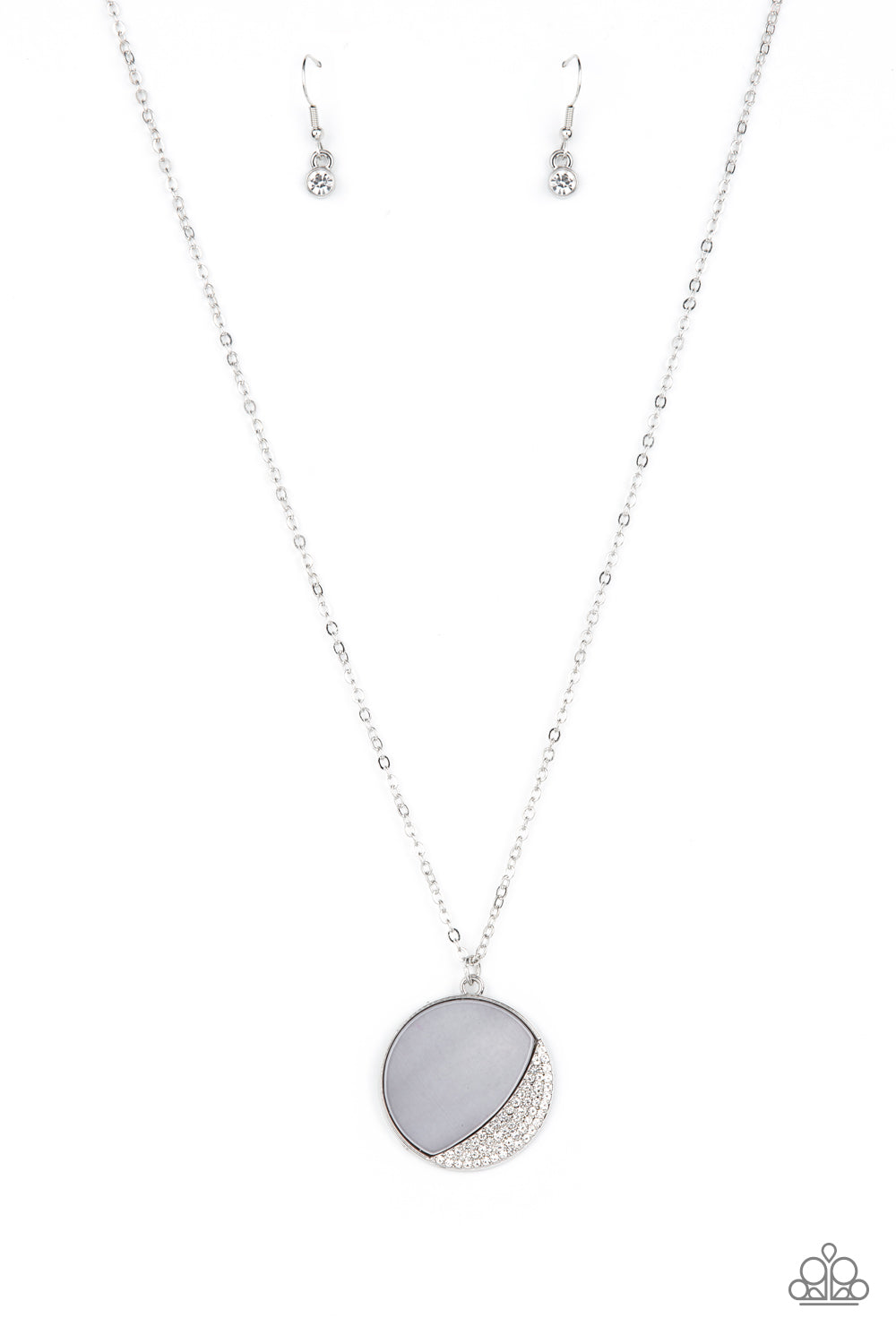 Oceanic Eclipse Silver Necklace - Paparazzi Accessories  An Ultimate Gray shell-like pendant is eclipsed in a half moon silver frame that is encrusted in sparkly white rhinestones, creating a shimmery display below the collar. Features an adjustable clasp closure.  Sold as one individual necklace. Includes one pair of matching earrings.