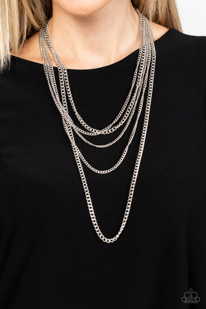 Top of the Food Chain Silver Necklace - Paparazzi Accessories  An intense display of mismatched silver chains boldly layer across the chest, resulting in an edgy industrial vibe. Features an adjustable clasp closure.  Sold as one individual necklace. Includes one pair of matching earrings.
