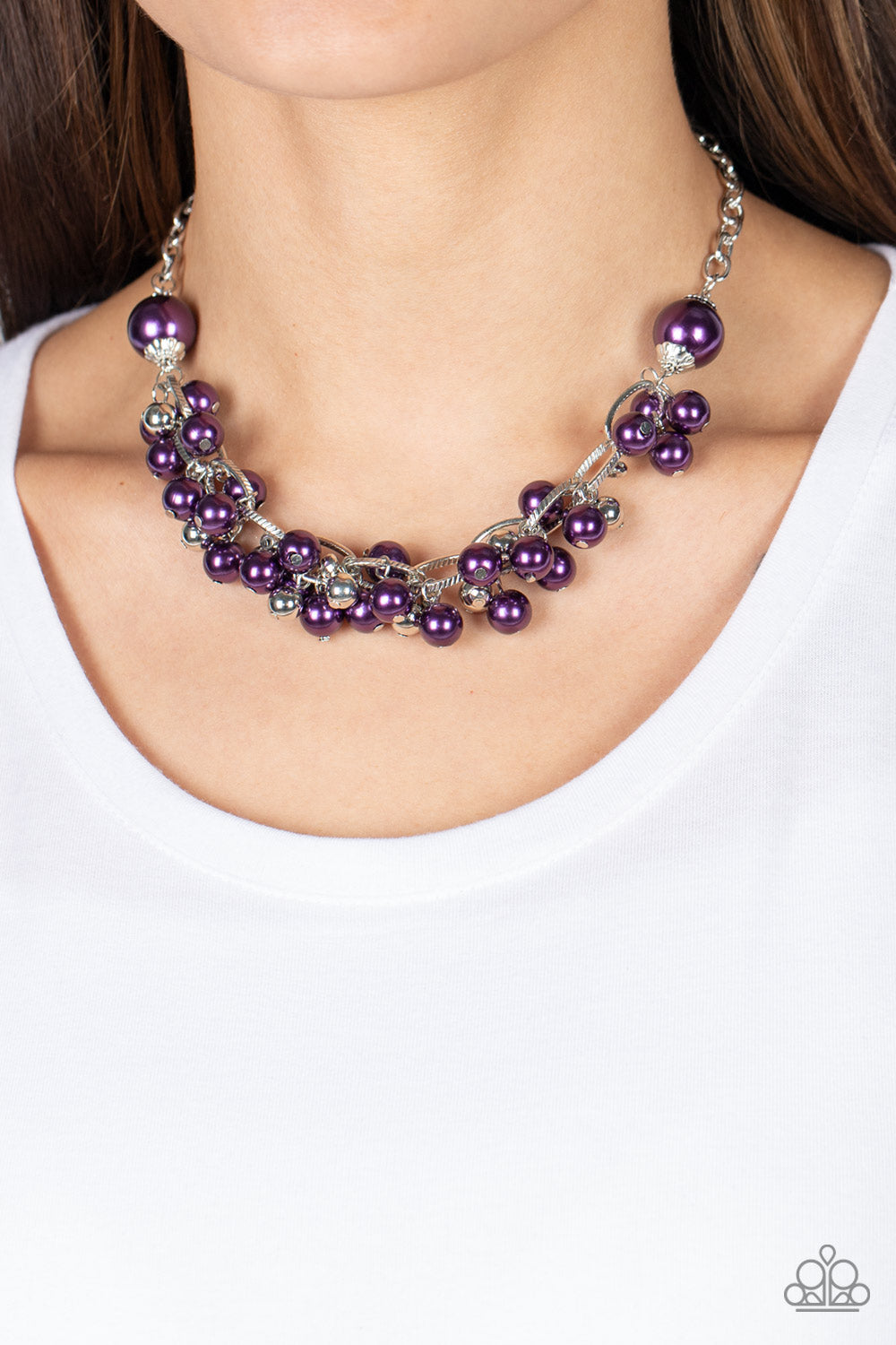Party Crasher Purple Necklace - Paparazzi Accessories  Two oversized plum pearls give way to a boisterous combination of textured silver links, shiny silver beads, and plum pearls, resulting into a noisemaking fringe below the collar. Features an adjustable clasp closure.  Sold as one individual necklace. Includes one pair of matching earrings.