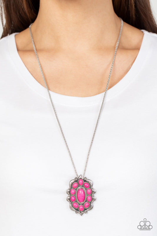 Mojave Medallion - Pink Item #P2SE-PKXX-223XX Vivacious pink oval stones embellish the front of a decoratively scalloped silver frame, creating an earthy floral pendant at the bottom of an extended silver popcorn chain. Features an adjustable clasp closure.  Sold as one individual necklace. Includes one pair of matching earrings.