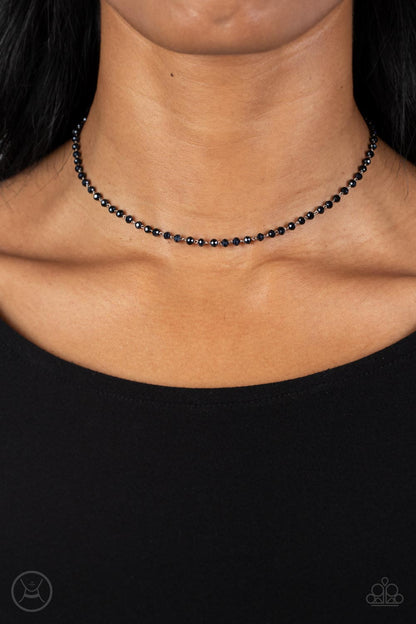 Mini MVP Blue Choker Necklace - Paparazzi Accessories  A dainty row of faceted metallic blue crystal-like beads delicately links around the neck, resulting in a radiant glimmer. Features an adjustable clasp closure.  Sold as one individual choker necklace. Includes one pair of matching earrings.