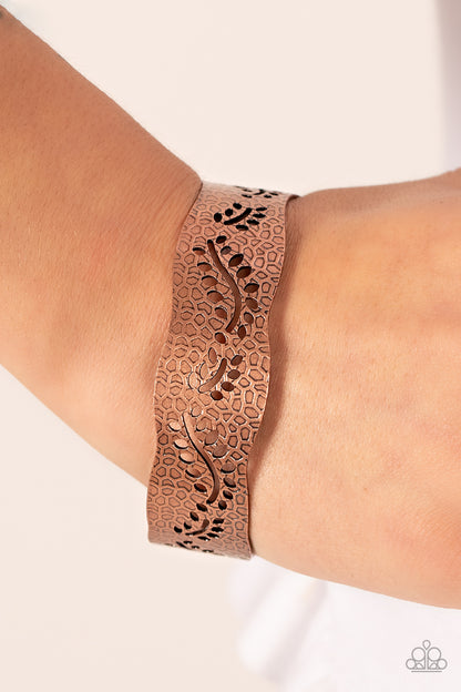 Savanna Oasis - Copper Item #P9BA-CPXX-073XX A wavy copper cuff is rustically embossed in an abstract honeycomb texture and stenciled in airy leafy patterns, resulting in a seasonal centerpiece around the wrist.  Sold as one individual bracelet.