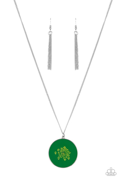 Prairie Picnic - Green Item #P2SE-GRXX-235XX Encased in a glassy fitting, a dainty bouquet of firework flowers blooms across a Leprechaun backdrop, resulting in a colorful floral pendant at the bottom of an extended silver chain. Features an adjustable clasp closure.  Sold as one individual necklace. Includes one pair of matching earrings.