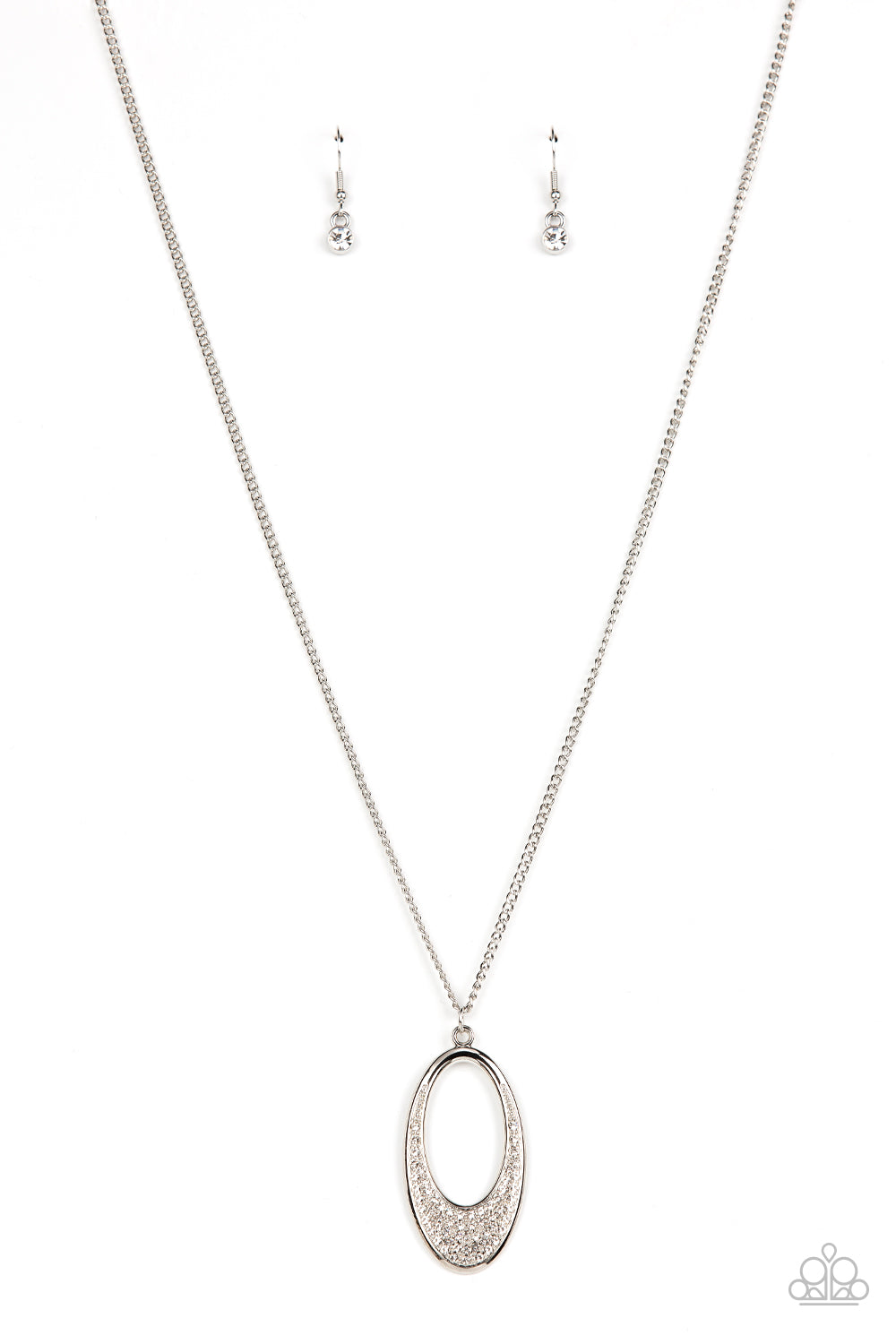 Dip Into Dazzle White Necklace - Paparazzi Accessories Item #P2RE-WTXX-576XX Encrusted with dazzling white rhinestones, a simple oval frame featuring an airy oval cutout creates a stylishly modern pendant at the end of a lengthened silver chain. Features an adjustable clasp closure.  Sold as one individual necklace. Includes one pair of matching earrings.