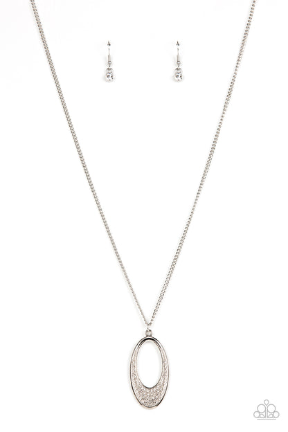 Dip Into Dazzle White Necklace - Paparazzi Accessories Item #P2RE-WTXX-576XX Encrusted with dazzling white rhinestones, a simple oval frame featuring an airy oval cutout creates a stylishly modern pendant at the end of a lengthened silver chain. Features an adjustable clasp closure.  Sold as one individual necklace. Includes one pair of matching earrings.