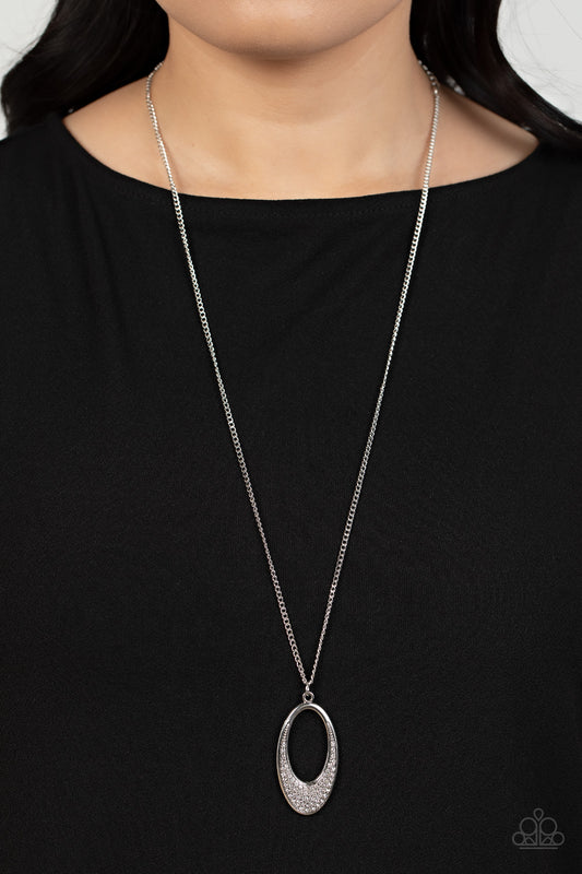 Dip Into Dazzle White Necklace - Paparazzi Accessories Item #P2RE-WTXX-576XX Encrusted with dazzling white rhinestones, a simple oval frame featuring an airy oval cutout creates a stylishly modern pendant at the end of a lengthened silver chain. Features an adjustable clasp closure.  Sold as one individual necklace. Includes one pair of matching earrings.