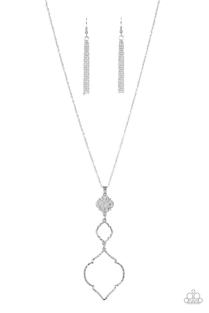 Marrakesh Mystery - Silver Item #P2WH-SVXX-362XX Featuring mandala-like patterns, a floral lattice frame gives way to mismatched scalloped silver frames, creating a magnificently stacked pendant at the bottom of an extended silver chain. Features an adjustable clasp closure.  Sold as one individual necklace. Includes one pair of matching earrings.