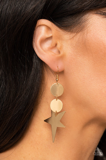 Star Bizarre Gold Earring - Paparazzi Accessories  An asymmetrical gold star radiates from two linked flat gold discs, resulting in a stellar lure. Earring attaches to a standard fishhook fitting.  Sold as one pair of earrings.