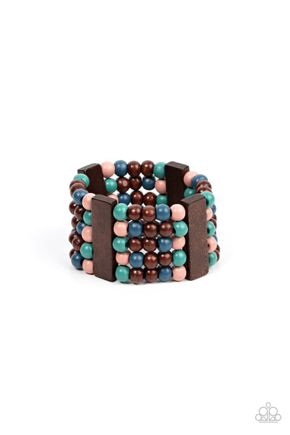 Island Soul Multi Wood Bracelet - Paparazzi Accessories  Colorful layers of blue, pink, brown, and turquoise wooden beads are threaded along stretchy bands between brown wooden bars creating stacks of subtle bliss around the wrist.  Sold as one individual bracelet.