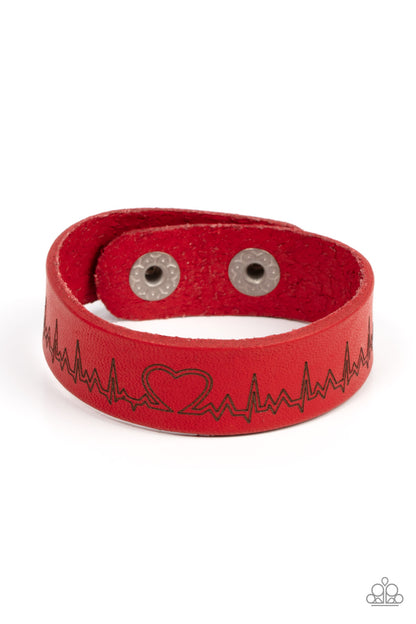 Haute Heartbeat Red Wrap Bracelet - Paparazzi Accessories  Culminating into a heart at the center, a zigzagging pattern reminiscent of a heartbeat is etched across the front of a red leather band around the wrist for a whimsical fashion. Features an adjustable snap closure.  Sold as one individual bracelet.