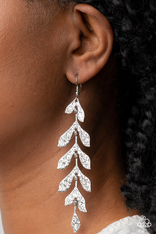 Lead From the FROND Silver Earring - Paparazzi Accessories  Hammered in a rustic finish, antiqued silver frames delicately link into a leafy lure for a seasonal inspired style. Earring attaches to a standard fishhook fitting.  Sold as one pair of earrings.