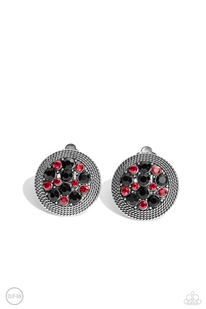 Stellar Status Multi Clip-On Earring - Paparazzi Accessories  A glitzy collection of red and black rhinestones are encircled with a silver rope-like border, resulting in a smoldering centerpiece. Earring attaches to a standard clip-on fitting.  Sold as one pair of clip-on earrings.  P5CO-MTXX-008XX