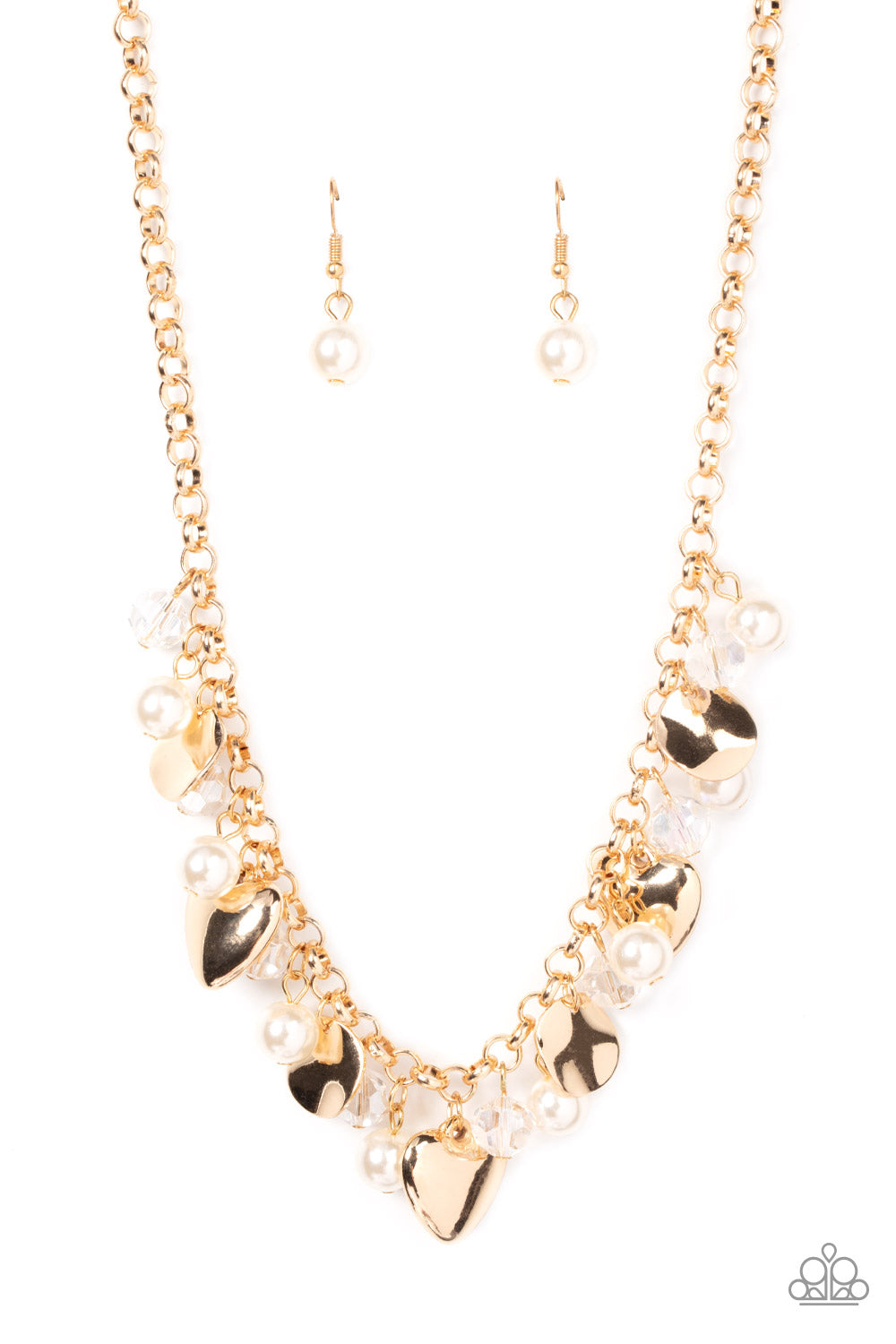 True Loves Trove Gold Necklace - Paparazzi Accessories  A flirtatious collection of white pearls, glassy white crystal-like beads, crinkled gold discs, and oversized locket inspired gold heart frames dance from a gold chain, resulting in a romantic fringe below the collar. Features an adjustable clasp closure.  Sold as one individual necklace. Includes one pair of matching earrings.