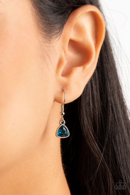 Galactic Duchess Blue Necklace - Paparazzi Accessories  A faceted asymmetrical blue gem is encased in a sleek silver frame at the bottom of a silver popcorn chain, creating a stellar pendant below the collar. Features an adjustable clasp closure.  Sold as one individual necklace. Includes one pair of matching earrings.