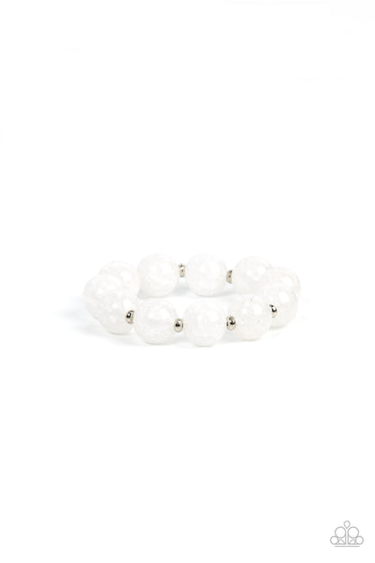 Arctic Affluence White Bracelet - Paparazzi Accessories  Infused with dainty silver accents, an oversized collection of crackly white glass-like beads are threaded along stretchy bands around the wrist for an icy look.  Sold as one individual bracelet.