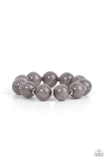 Arctic Affluence Silver Bracelet - Paparazzi Accessories  Infused with dainty silver accents, an oversized collection of crackly gray glass-like beads are threaded along stretchy bands around the wrist for an icy look.  Sold as one individual bracelet.