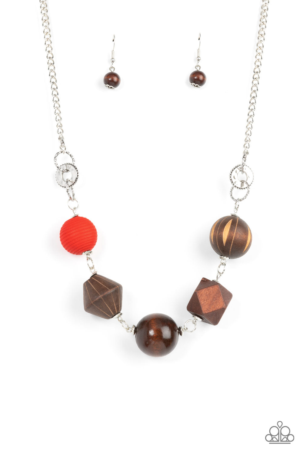 Eco Extravaganza Red Necklace - Paparazzi Accessories  Infused with a solitaire red wooden bead, a mismatched assortment of studded silver hoops, textured silver rings, and oversized brown wooden beads delicately connect across the chest for a stylishly handcrafted fashion. Features an adjustable clasp closure.  Sold as one individual necklace. Includes one pair of matching earrings.