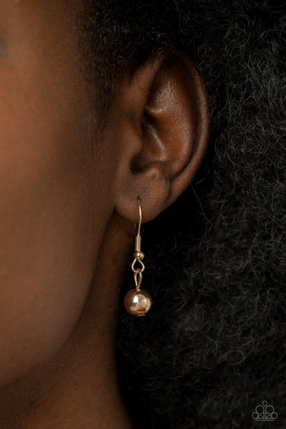 Metro Milestone Rose Gold Necklace - Paparazzi Accessories  Gradually increasing in size, a glistening collection of rose gold beads and rose gold hoops alternate across the chest for a classic metallic fashion. Features an adjustable clasp closure.  Sold as one individual necklace. Includes one pair of matching earrings.