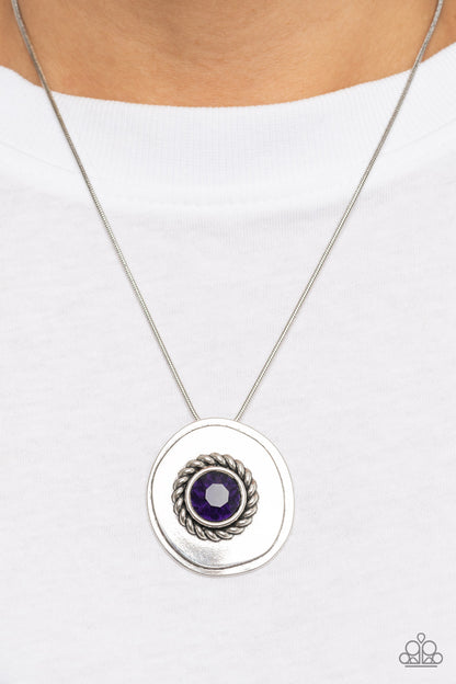 Make Me a MEDALLION-aire - Purple Item #P2RE-PRXX-261XX An oversized purple rhinestone adorns the textured center of an asymmetrical silver disc, creating an edgy medallion at the bottom of a rounded silver snake chain below the collar. Features an adjustable clasp closure.  Sold as one individual necklace. Includes one pair of matching earrings.