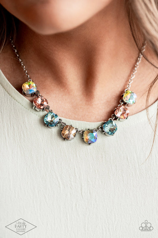 Dreamy Decorum Multi Necklace - Paparazzi Accessories  A pretty pastel palette of multicolored rhinestones, set in classic silver pronged fittings, creates sparkle and shine as they dance below the collar. Features an adjustable clasp closure.  Sold as one individual necklace. Includes one pair of matching earrings.