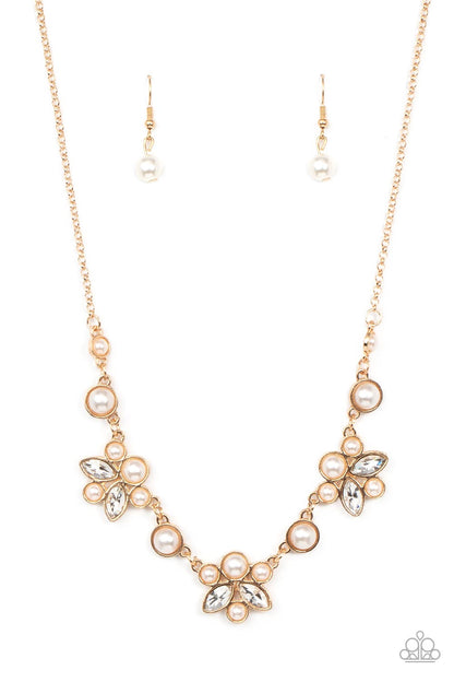 Royally Ever After Gold Necklace - Paparazzi Accessories  Infused with solitaire pearls, dainty clusters of bubbly white pearls and glassy white marquise style rhinestones delicately gather into clustered frames below the collar for an elegantly timeless finish. Features an adjustable clasp closure.  Sold as one individual necklace. Includes one pair of matching earrings.