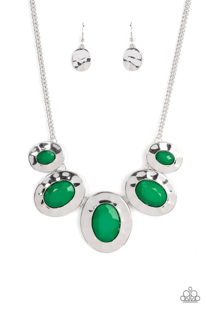 Rivera Rendezvous Green Necklace - Paparazzi Accessories  Gradually increasing in size, hammered silver oval frames are dotted with opalescent Leprechaun beads as they delicately link below the collar for a refreshing pop of color. Features an adjustable clasp closure.  Sold as one individual necklace. Includes one pair of matching earrings.