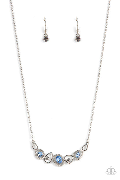 Celestial Cadence Blue Necklace - Paparazzi Accessories  An incandescent assortment of shiny silver frames, dainty white rhinestones, and oversized blue gems delicately coalesce into a statement-making sparkle below the collar. Features an adjustable clasp closure.  Sold as one individual necklace. Includes one pair of matching earrings.