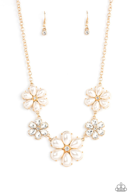 Fiercely Flowering Gold Necklace - Paparazzi Accessories  Featuring glassy white rhinestone centers, bubbly pearl petaled gold flowers gradually increase in size as they alternate with white rhinestone petaled flowers below the collar for a fierce floral fashion. Features an adjustable clasp closure.  Sold as one individual necklace. Includes one pair of matching earrings.
