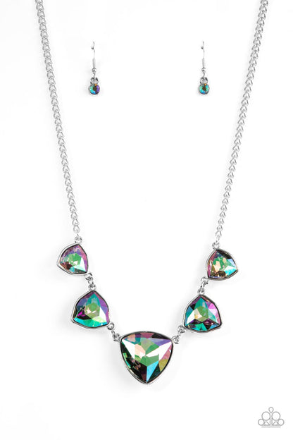 Cosmic Constellations Multi Necklace - Paparazzi Accessories  Encased in sleek silver fittings, an oversized collection of UV geometric gems gradually increase in size as they link below the collar for a stellar statement. Features an adjustable clasp closure. Due to its prismatic palette, color may vary.  Sold as one individual necklace. Includes one pair of matching earrings.