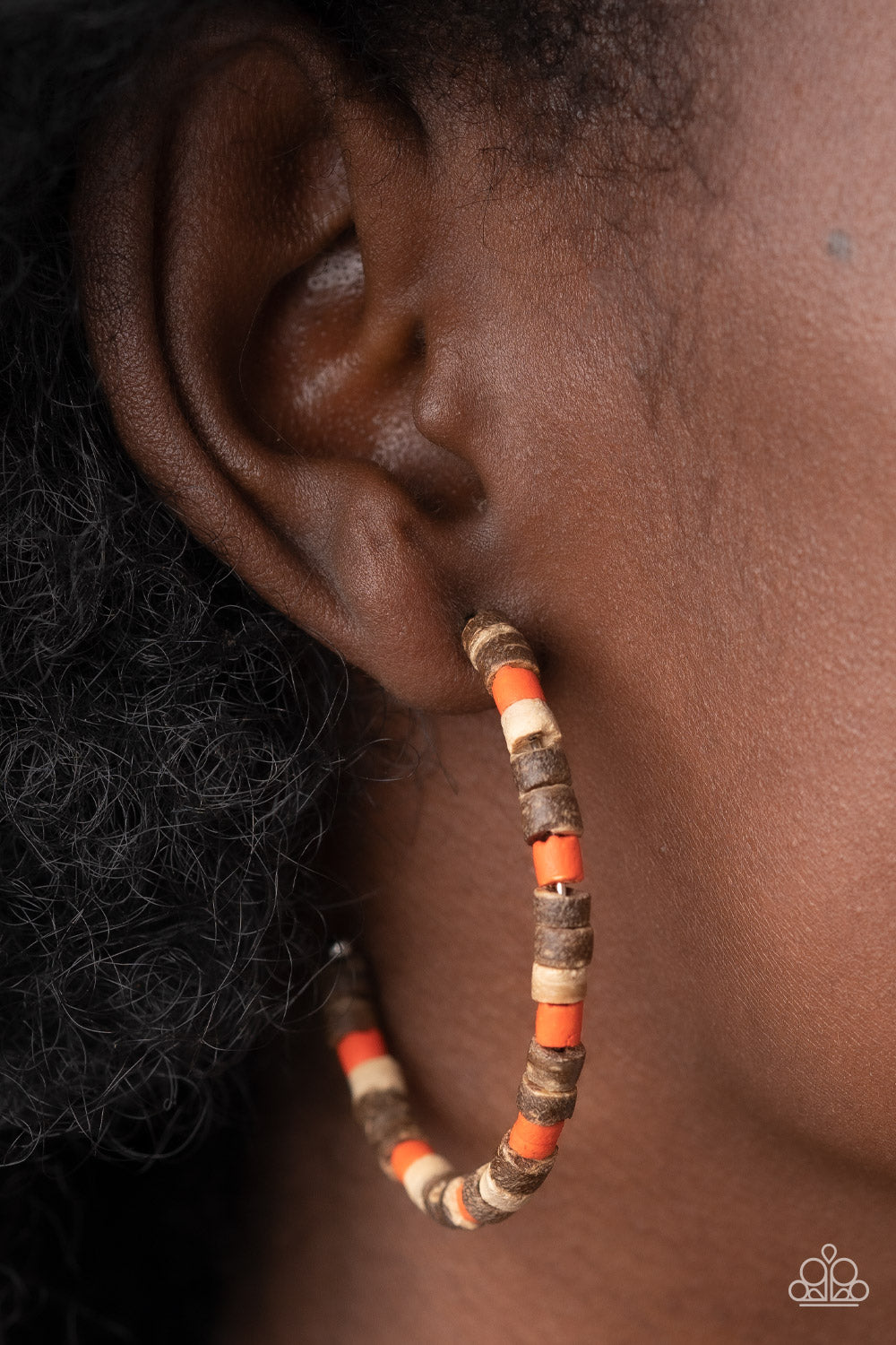 Effortlessly Earthy Orange Hoop Earring - Paparazzi Accessories  An earthy assortment of orange and rustic wood beads are threaded along a classic silver hoop, resulting in an earthy centerpiece. Earring attaches to a standard post fitting. Hoop measures approximately 2" in diameter.  Sold as one pair of hoop earrings.