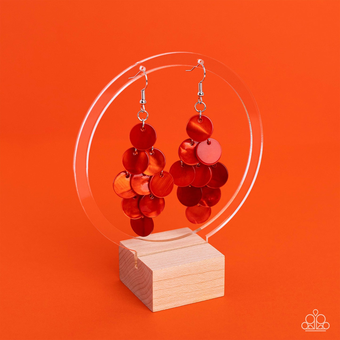 Tropical Tryst Burnt Orange Earring - Paparazzi Accessories  Tiers of Burnt Orange shell-like discs cascade from a silver netted backdrop, resulting in a summery shimmer. Earring attaches to a standard fishhook fitting.  Sold as one pair of earrings.
