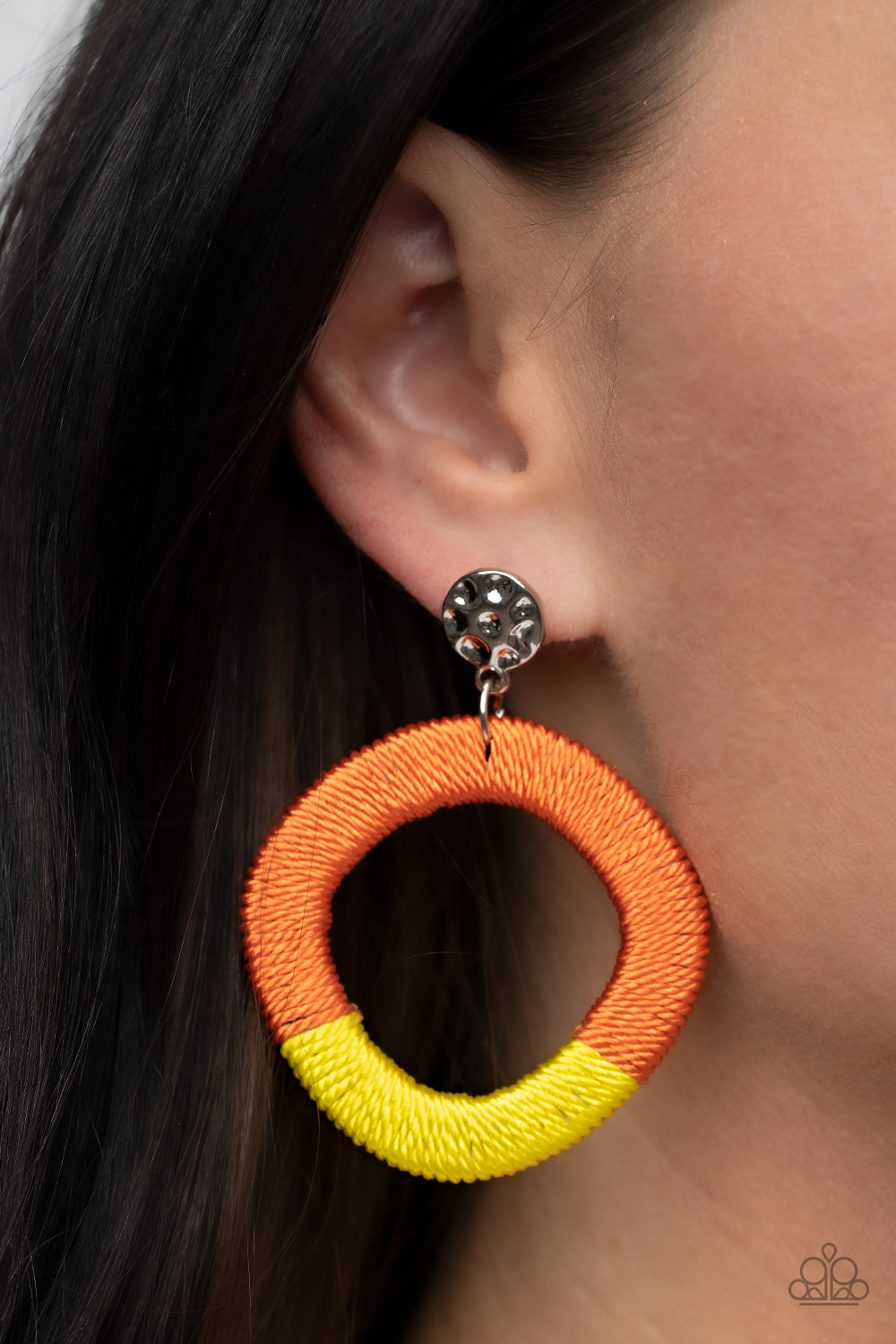 Thats a WRAPAROUND Multi Post Earring - Paparazzi Accessories  A hammered silver disc gives way to a wooden frame decoratively wrapped in shiny orange and yellow threaded accents, creating a colorful lure. Earring attaches to a standard post fitting.  Sold as one pair of post earrings.