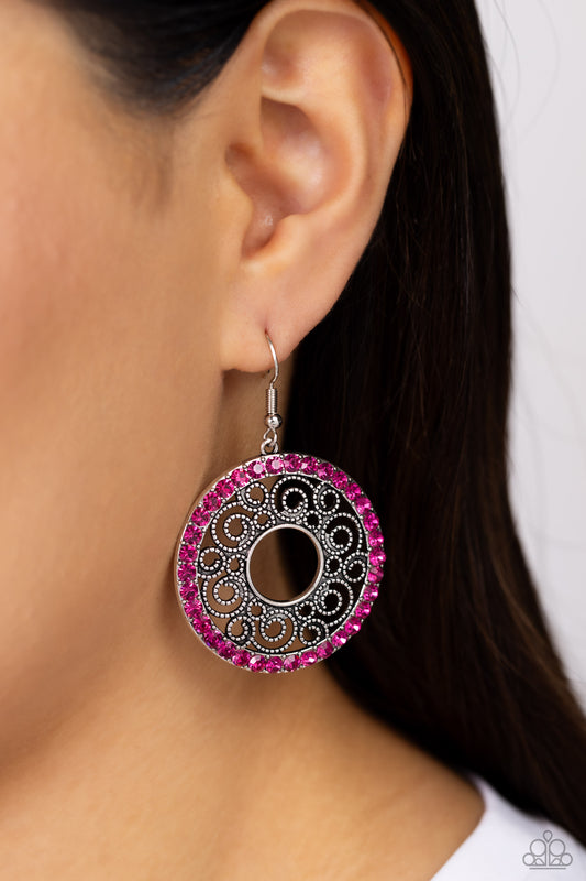 Whirly Whirlpool Pink Earring - Paparazzi Accessories  Bordered in a ring of glittery Fuchsia Fedora rhinestones, a rustic silver hoop is filled with whirly silver filigree for a wistful finish. Earring attaches to a standard fishhook fitting.  Sold as one pair of earrings.  P5RE-PKXX-250XX