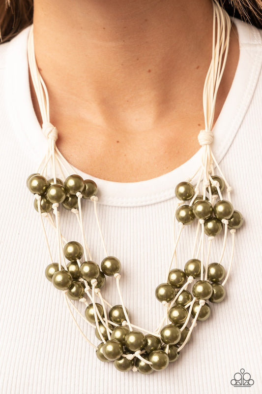 Yacht Catch Green Necklace- Paparazzi Accessories   A collection of bubbly green pearls are knotted in place along strands of white cording, resulting in boisterous layers below the collar. Features a button-loop closure.  Sold as one individual necklace. Includes one pair of matching earrings.
