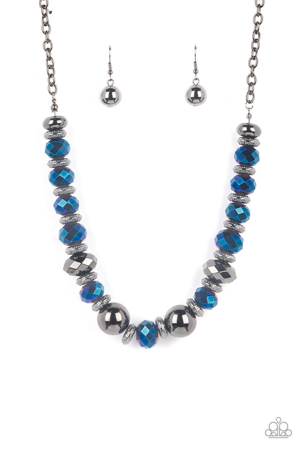Interstellar Influencer Blue Necklace - Paparazzi Accessories  A dramatic assortment of oversized gunmetal beads, textured gunmetal rings, and faceted metallic blue gems delicately glides along an invisible wire below the collar, resulting in a stellar sparkle. Features an adjustable clasp closure. Includes one pair of matching earrings.