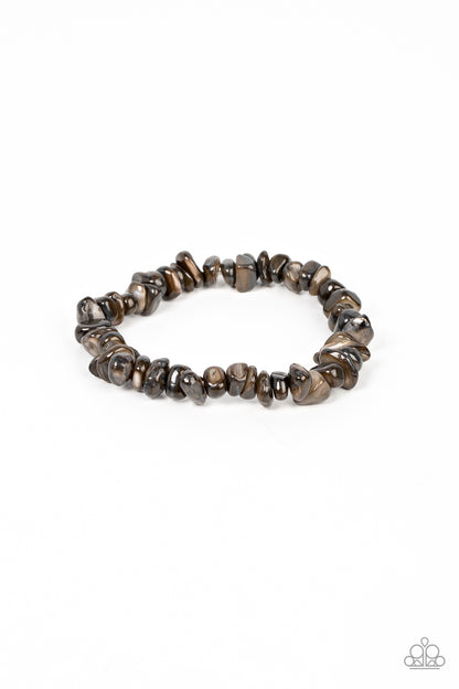 Grounded for Life Black Urban Bracelet - Paparazzi Accessories  An earthy assortment of shiny black pebble-like stones are threaded along a stretchy band around the wrist, resulting in a grounding pop of color.  Sold as one individual bracelet.