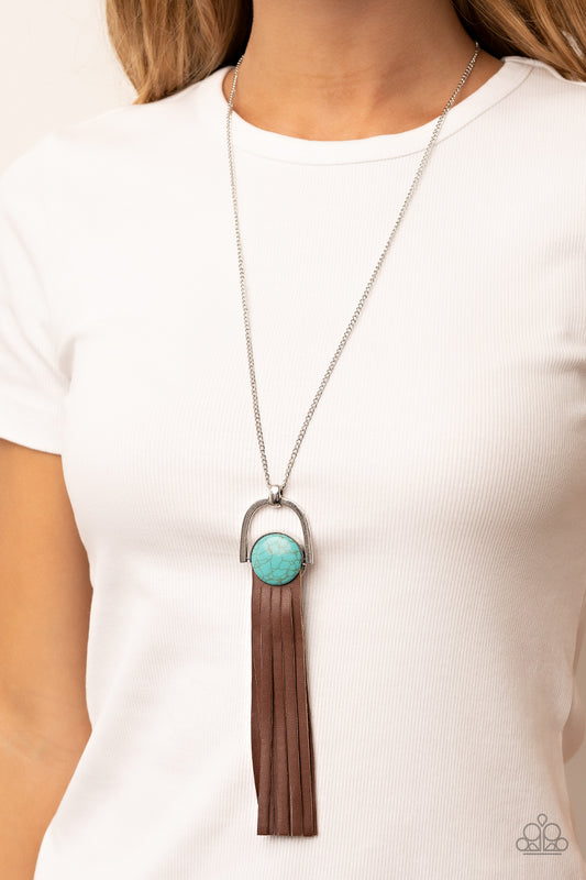 Winslow Wanderer - Blue Item #P2SE-BLXX-435XX Strips of brown leather fan out from the bottom of a round turquoise stone that is threaded along a metal rod that attaches to the bottom of a silver horseshoe frame. The earthy pendant swings from the bottom of an extended silver chain, resulting in a wildly wonderful tassel. Features an adjustable clasp closure.  Sold as one individual necklace. Includes one pair of matching earrings.