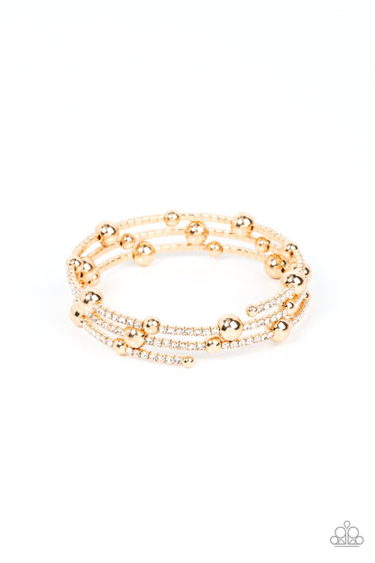 Spontaneous Shimmer Gold Bracelet - Paparazzi Accessories  Spontaneously interrupted by glistening gold beads, a sparkly strand of white rhinestones coils around the wrist, resulting in an irresistible infinity wrap bracelet.  Sold as one individual bracelet.