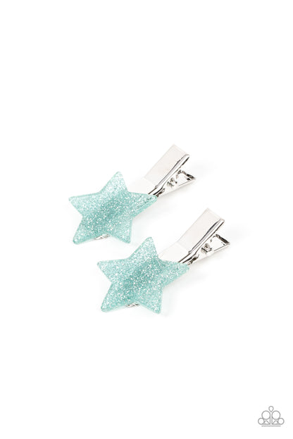 Sparkly Star Chart Blue Hair Clip - Paparazzi Accessories  Sprinkled in glitter, a pair of blue acrylic stars pull back the hair for a stellar fashion. Features standard hair clips on the back.  Sold as one pair of hair clips.