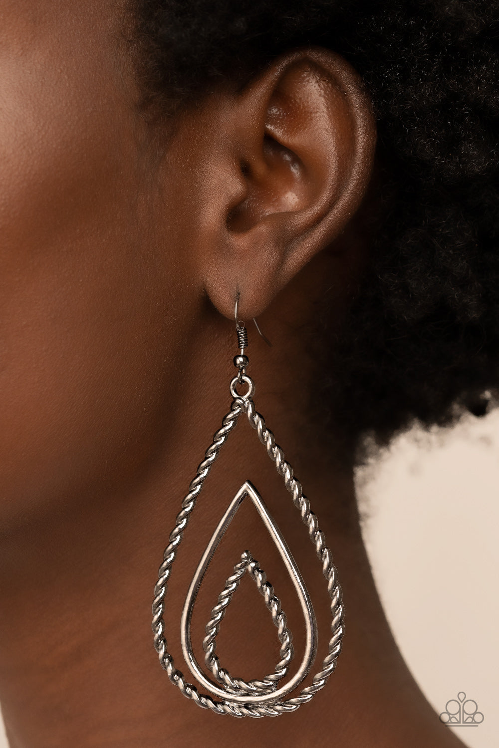 Tastefully Twisty Black Earring - Paparazzi Accessories   Smooth and twisted gunmetal teardrops stack into a rippling lure for an edgy look. Earring attaches to a standard fishhook fitting.  Sold as one pair of earrings.