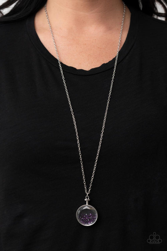 Twinkly Treasury Purple Necklace - Paparazzi Accessories  A glitzy collection of twinkly purple crystals sparkle inside a faceted glass and silver fitting, resulting in a glittery trinket at the bottom of an extended silver chain. Features an adjustable clasp closure.  Sold as one individual necklace. Includes one pair of matching earrings.