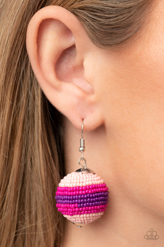 Zest Fest Pink Earring - Paparazzi Accessories  Strands of Pale Rosette, Fuchsia Fedora, and purple seed beads decoratively spin around a spherical frame, resulting in a colorful 3-dimensional display. Earring attaches to a standard fishhook fitting.  Sold as one pair of earrings.