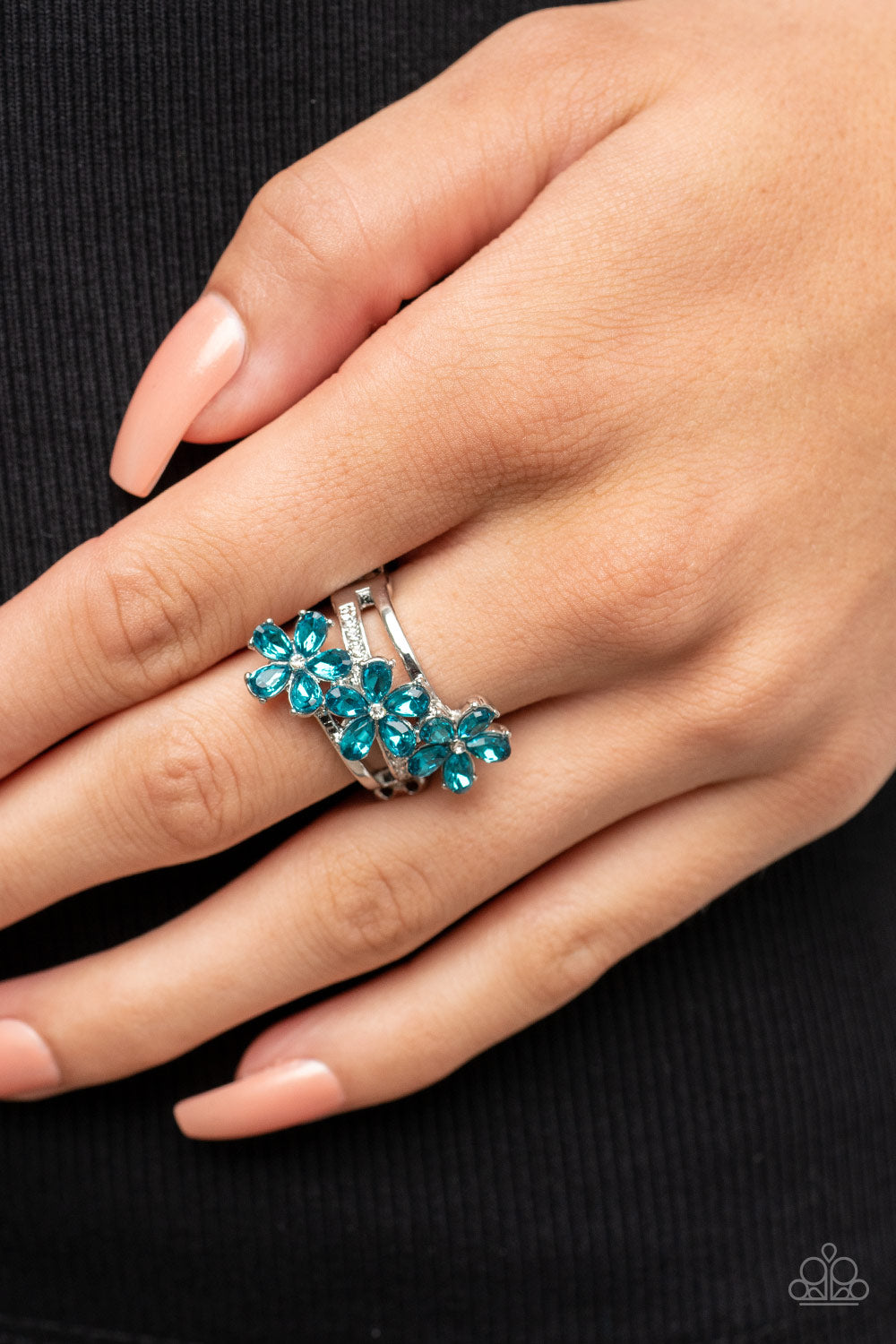 Posh Petals - Blue Item #P4DA-BLXX-087XX Dotted with dainty white rhinestone centers, blue rhinestone petaled floral frames slant across layers of plain silver and white rhinestone encrusted silver bands for a sparkly efflorescence. Features a stretchy band for a flexible fit.  Sold as one individual ring.